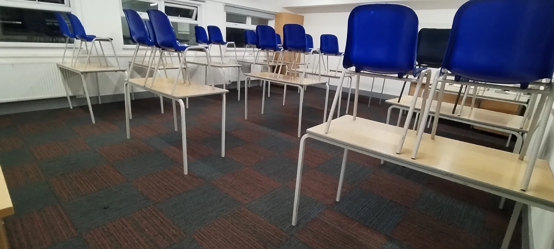 Clean training or waiting area with arranged seating