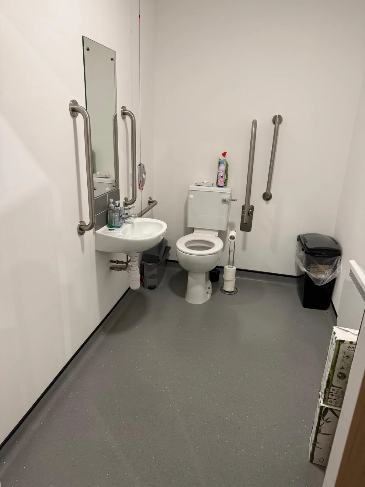 Freshly cleaned accessible commercial washroom