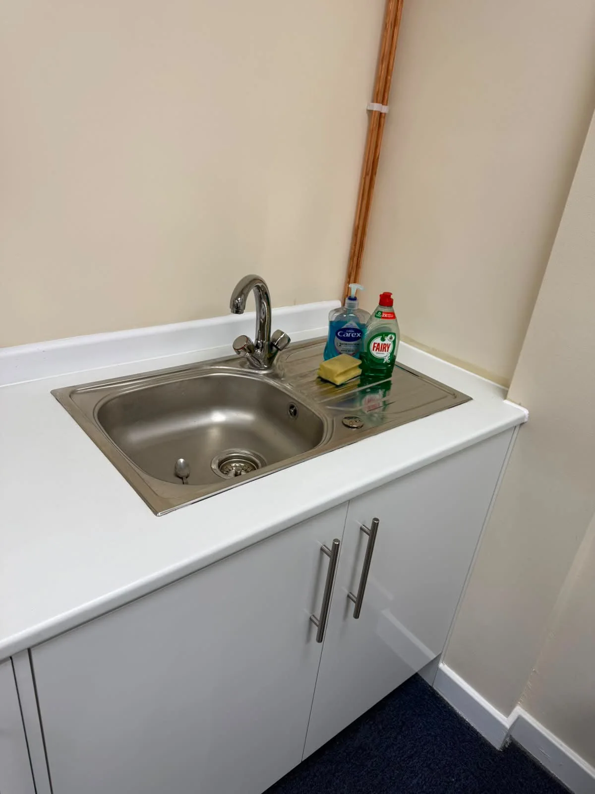 Clean staff sink and kitchenette unit