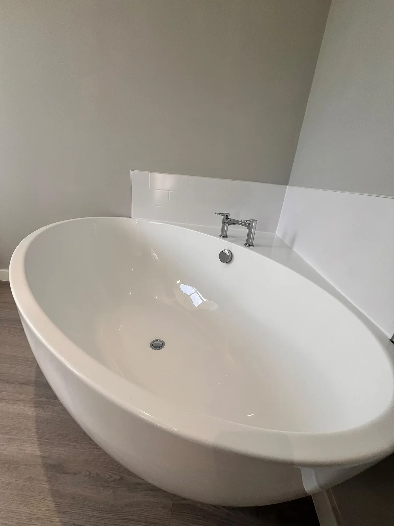 Freestanding bath cleaned and polished