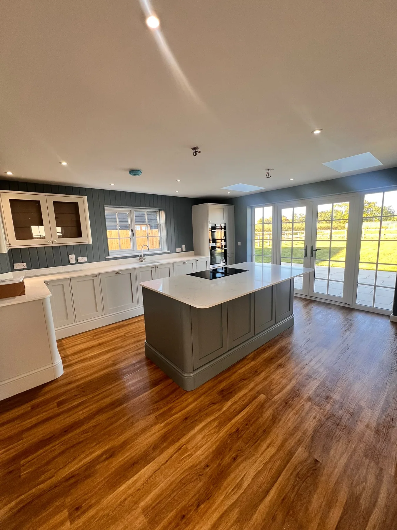 Bright open-plan kitchen cleaned and finished