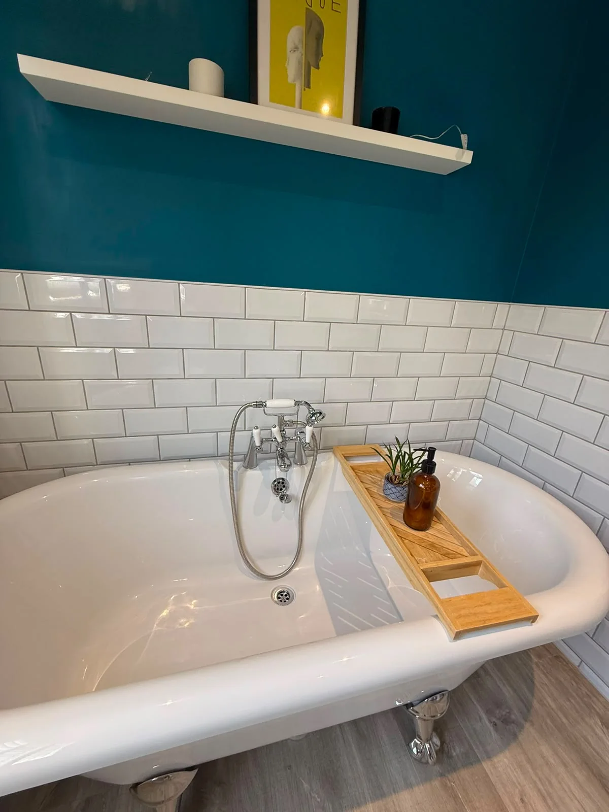 Clean traditional bath and tiled wall