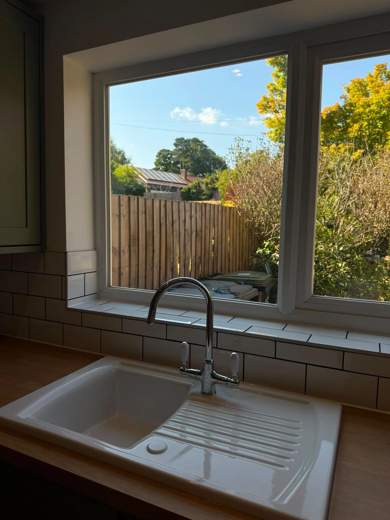 Clean sink, draining board and window