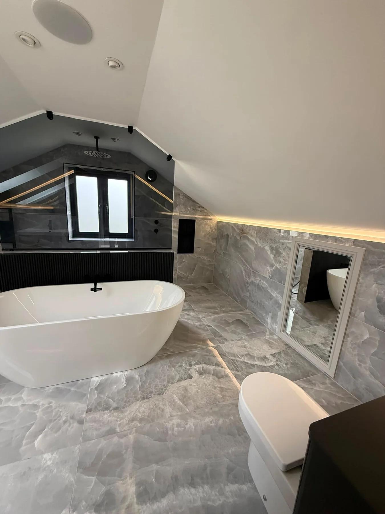 Modern bathroom with freestanding bath